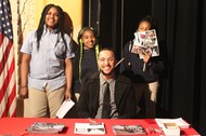 Rutgers Tevin Resse with students
